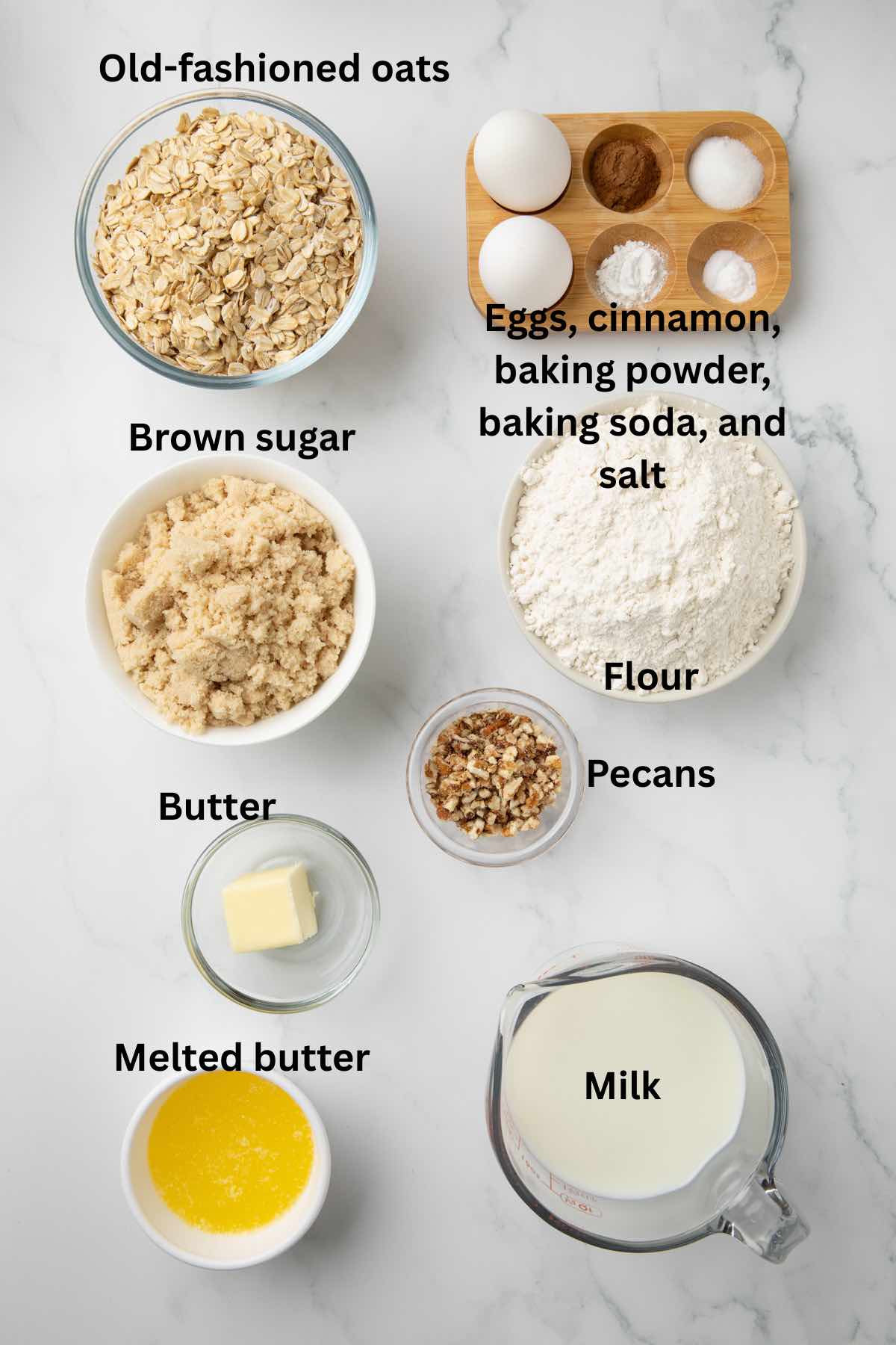 Ingredients for cinnamon oatmeal muffins includes oatmeal, flour, milk, eggs, pecans, baking soda, cinnamon, and baking powder. 