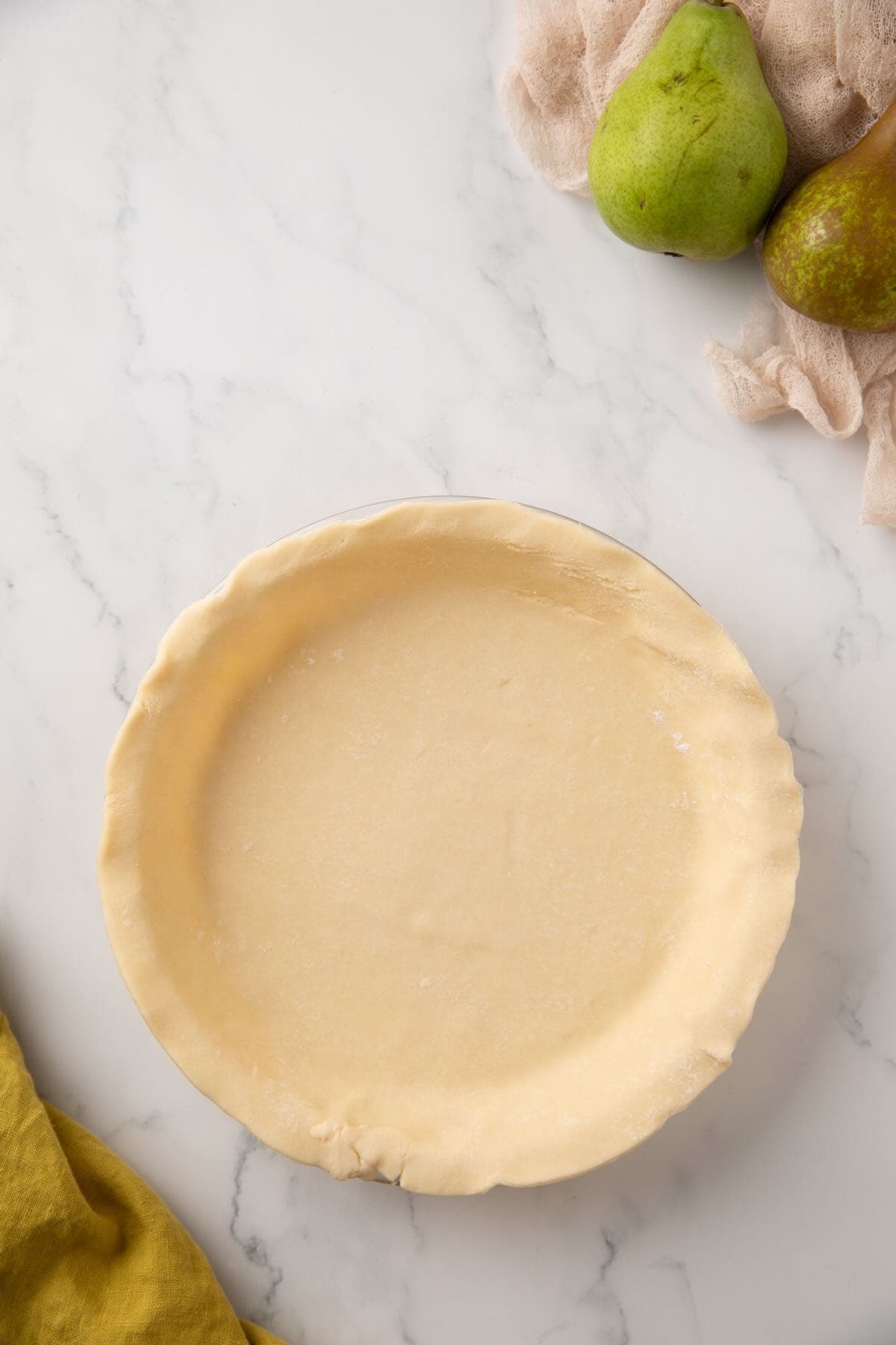 Unbaked bottom pie crust in a pie pan.
