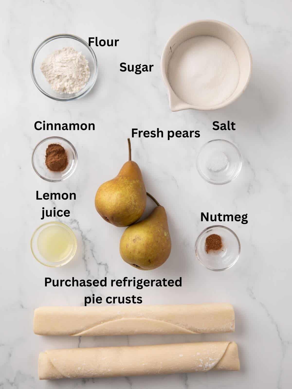 Pear pie ingredients include, fresh pears, flour, cinnamon, nutmeg, sugar, and pie crusts. 