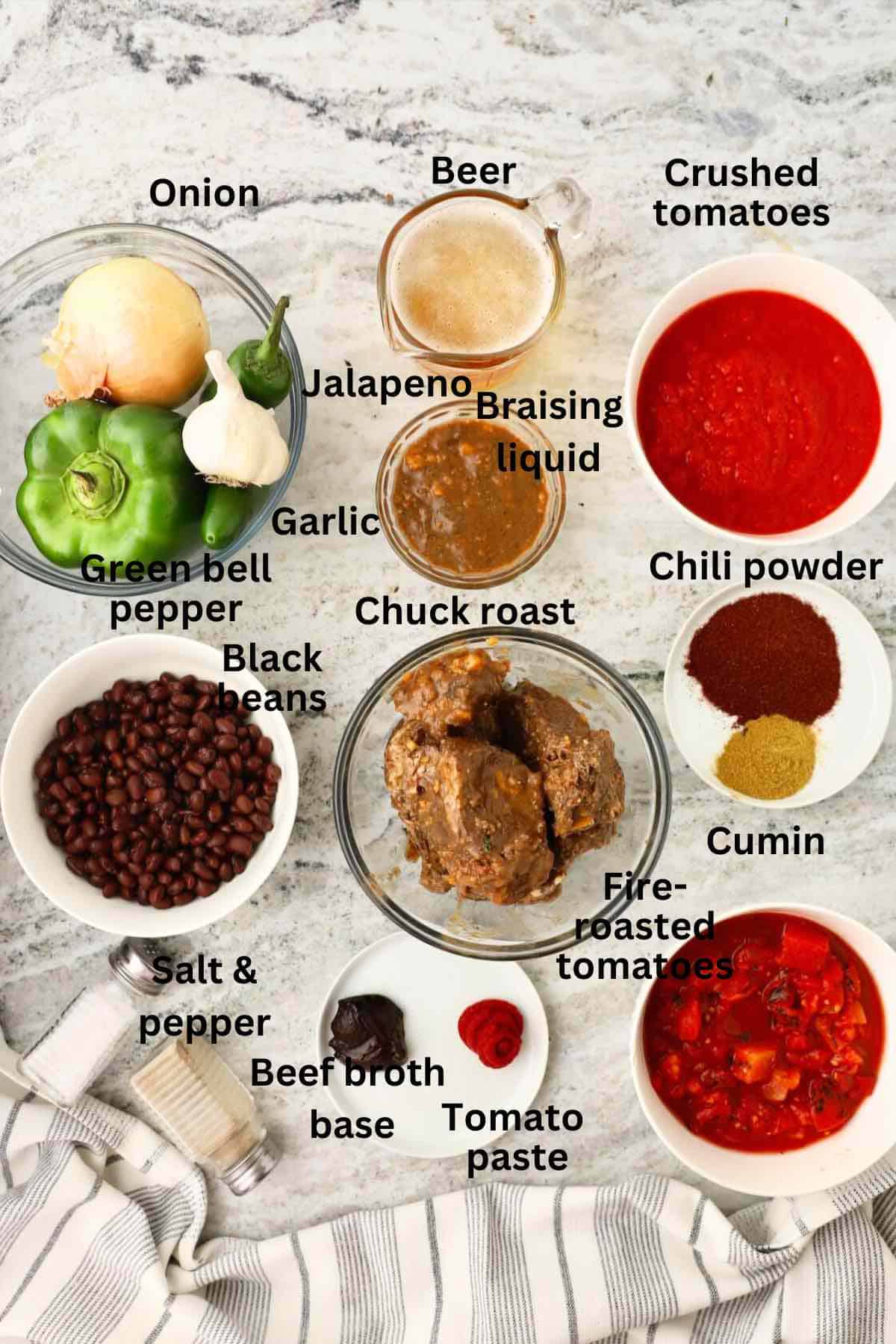 Ingredients for chuck roast chili include leftover chuck roast, bell pepper, onion, black beans, canned tomatoes, beef broth, and chili powder. 