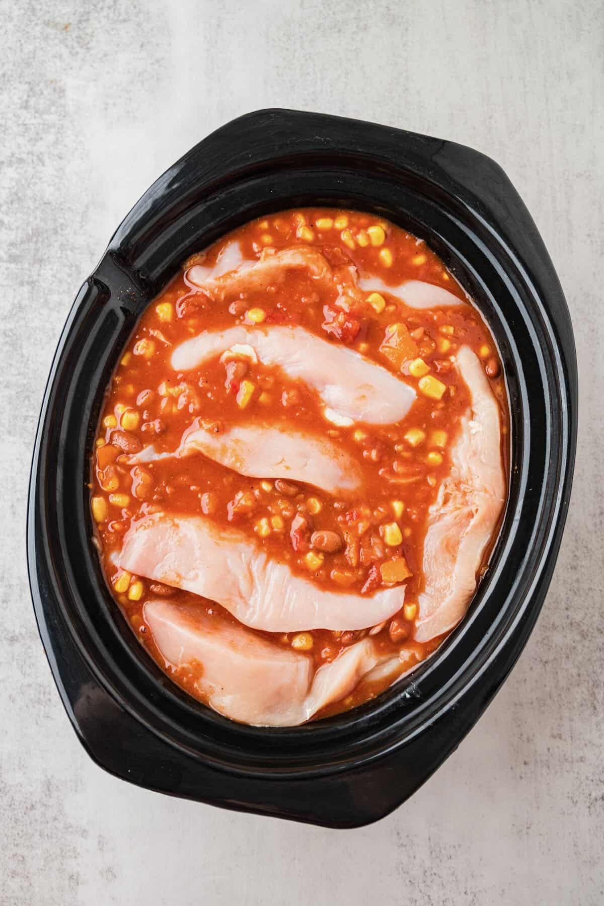 Nestle the chicken into the soup mixture.