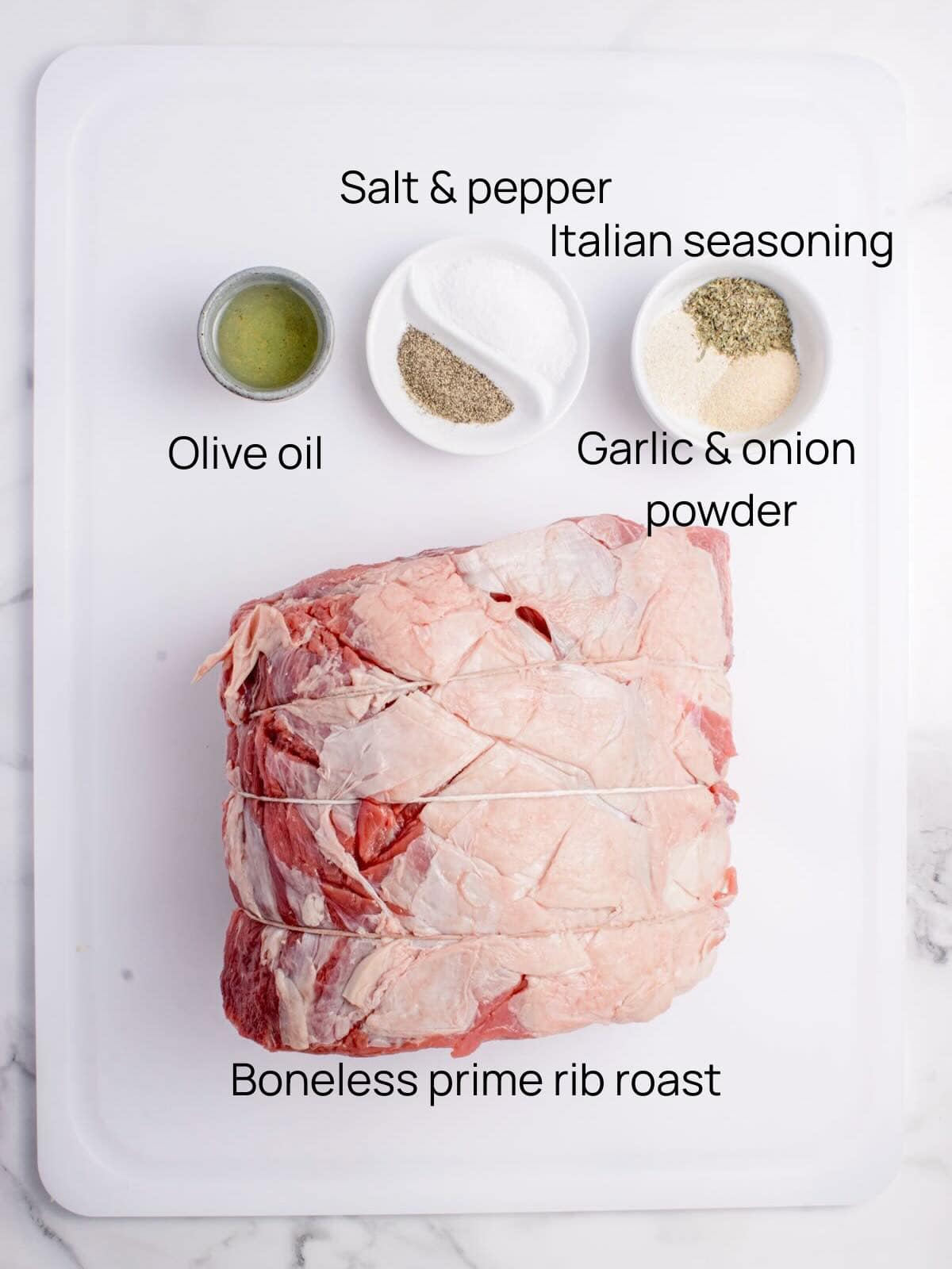 Ingredients needed to roast a boneless prime rib roast include the roast, olive oil, salt and pepper and garlic and onion powder.