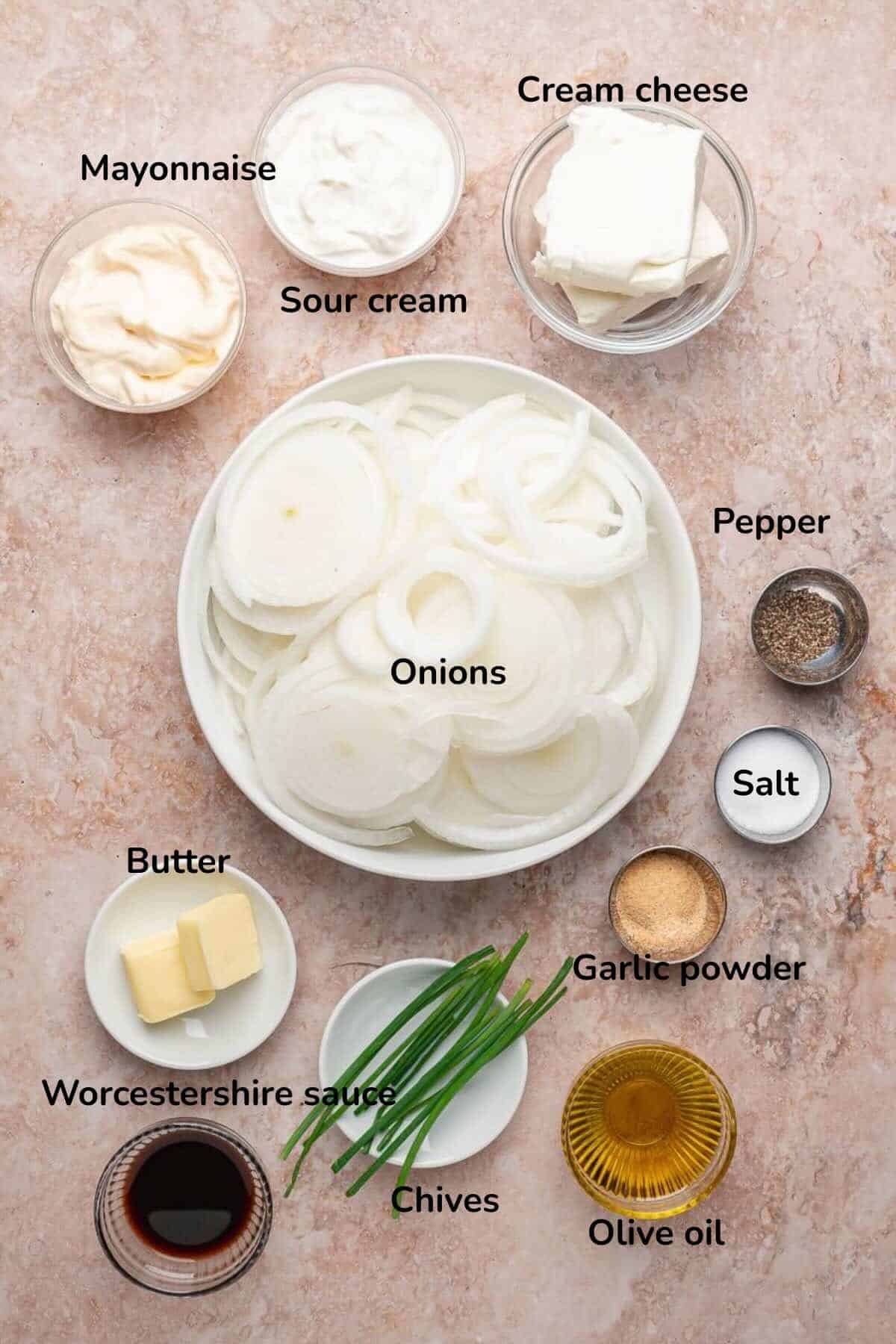 Ingredients for caramelized onion dip include sliced onions, sour cream cheese, mayo, and seasonings.