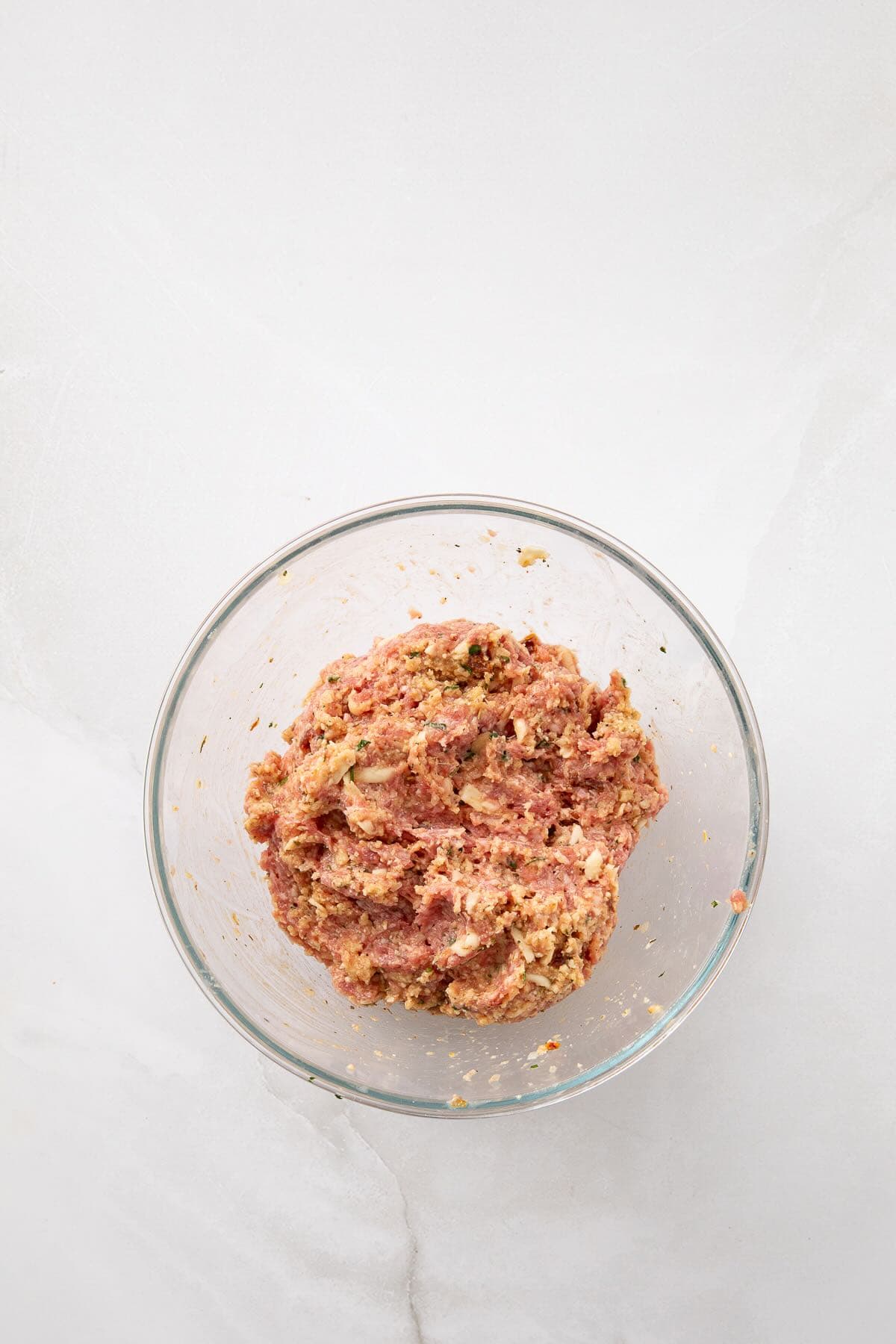 Meat, mozzarella cheese and herbs are added to the meatloaf base.