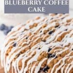 Pinterest pin with a A Lemon Blueberry Coffee Cake topped with blueberries, streusel, and lemon glaze on a cutting board.