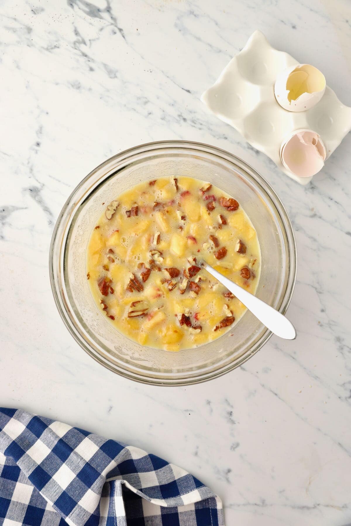 Add eggs, sour cream & peaches to the oil & sugar.