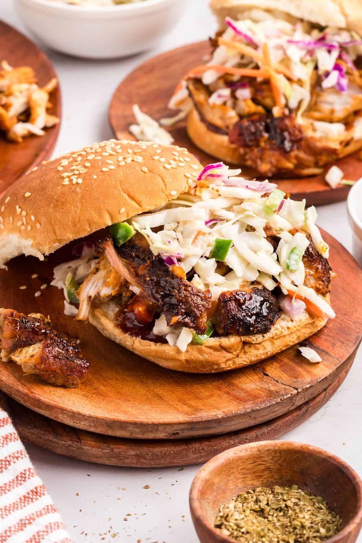 Air-fried pork is on a bun with coleslaw.