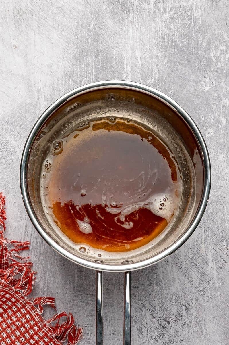 Brown butter in a metal saucepan.