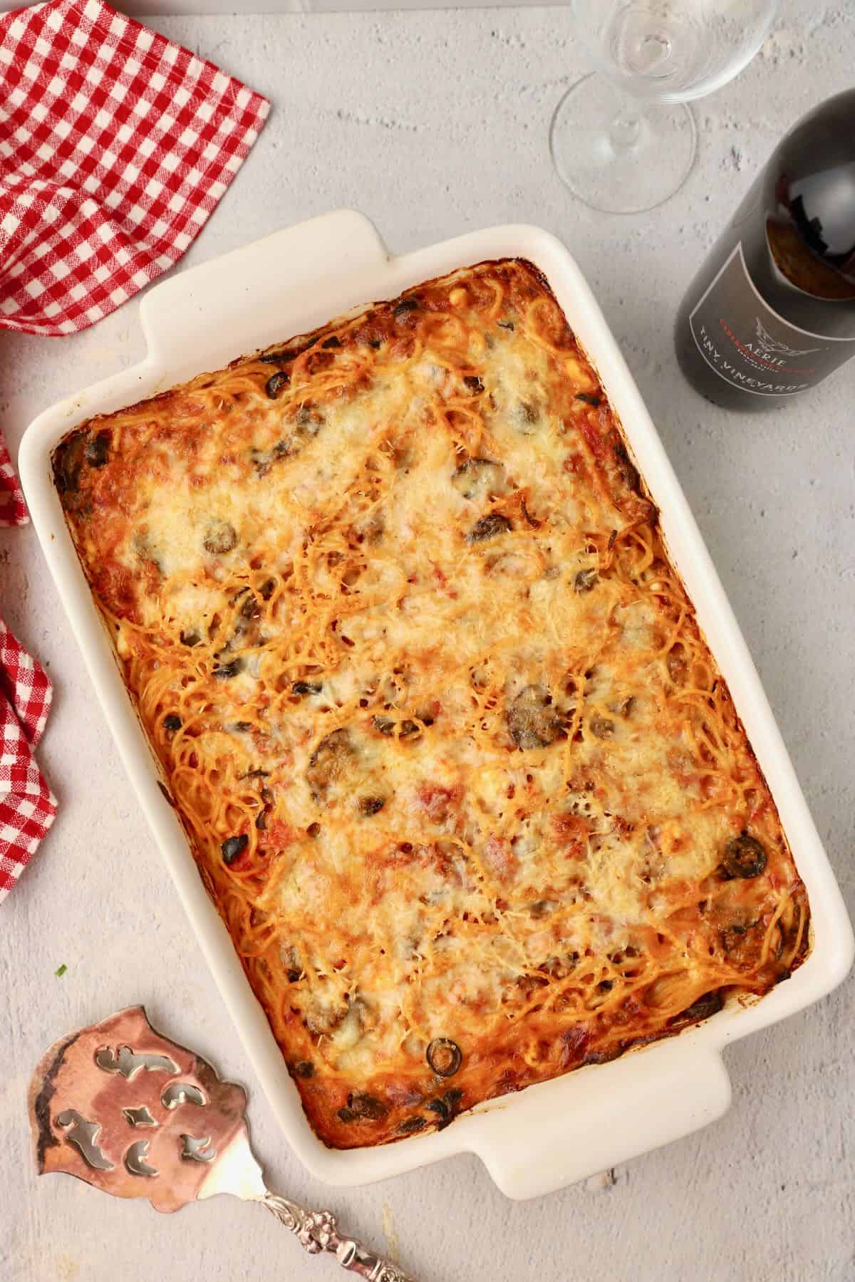 Baked Spaghetti Pie Casserole in a white baking dish.