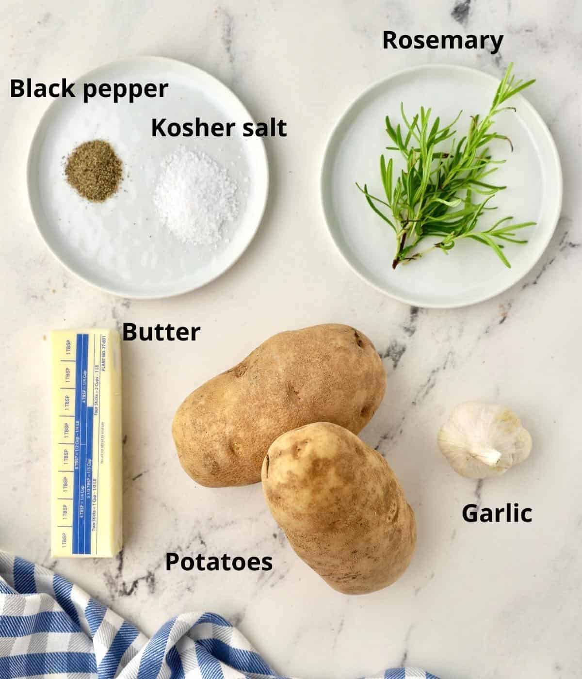 Ingredients for Hasselback potatoes include two potatoes, butter, rosemary, and salt and pepper.
