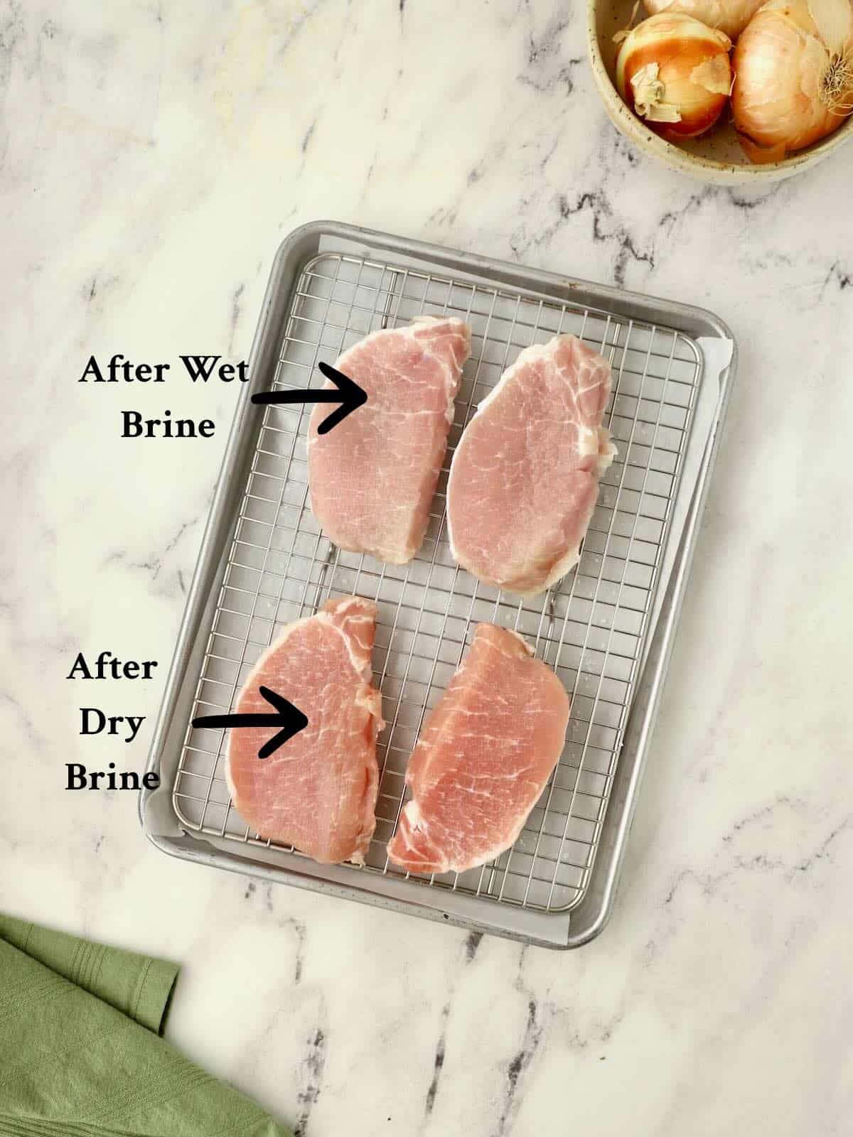 Four pork chops, the two on the top were wet brined, the bottom two were dry brined.