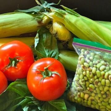 Fresh corn, tomatoes, and peas from the farmer's market.