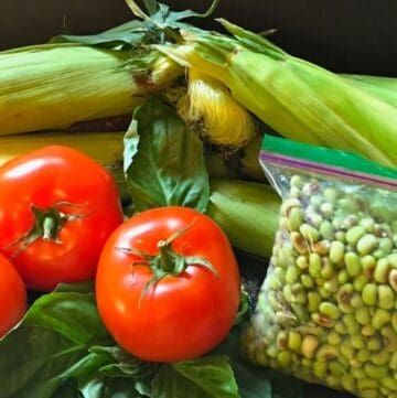 Fresh corn, tomatoes, and peas from the farmer's market.