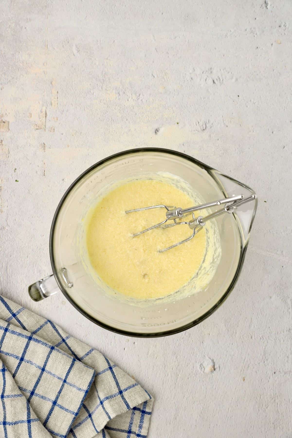 Add egg and sour cream to the muffin batter.