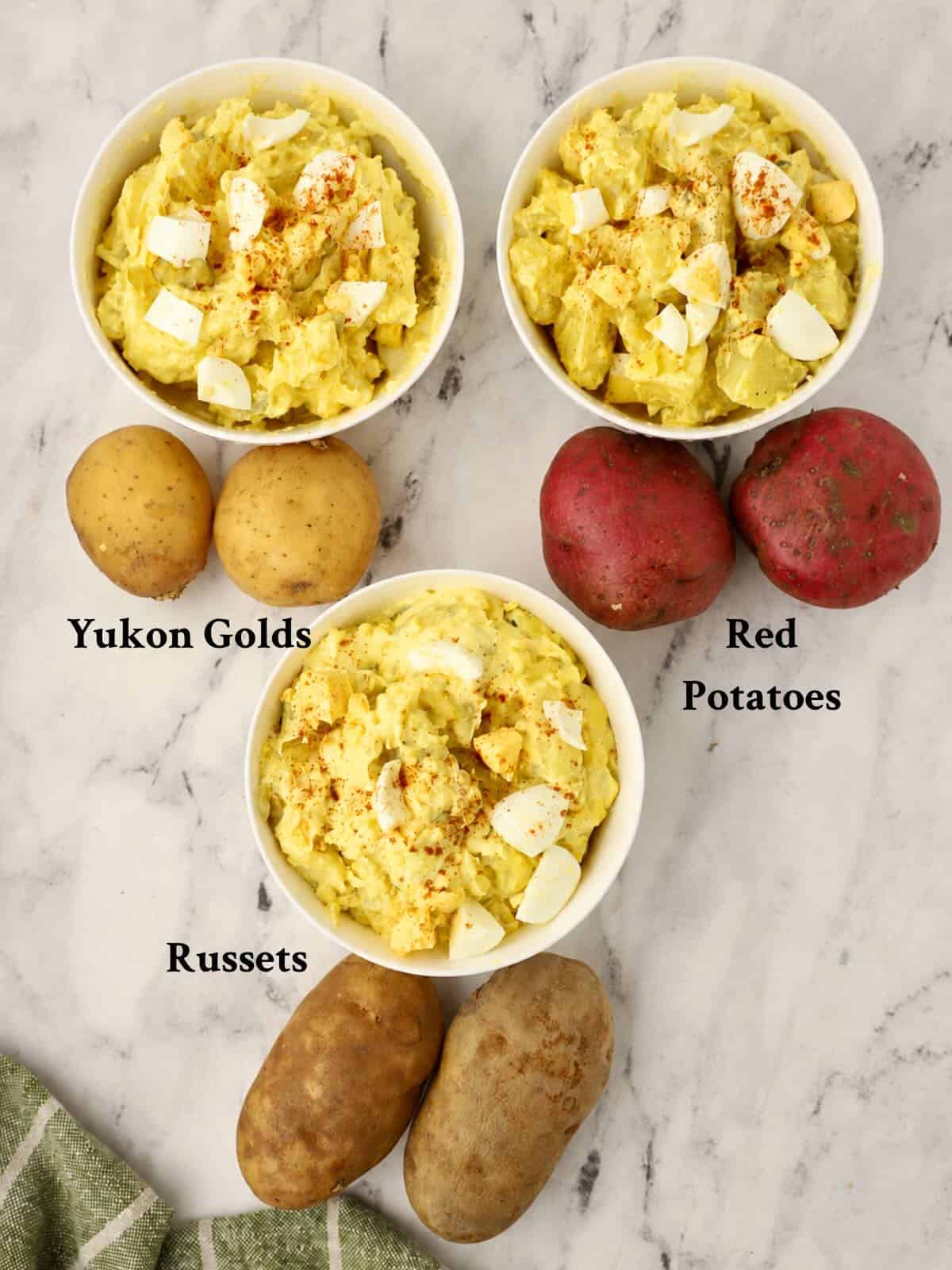 Three bowls of Southern Potato Salad made with three different varieties of potatoes.