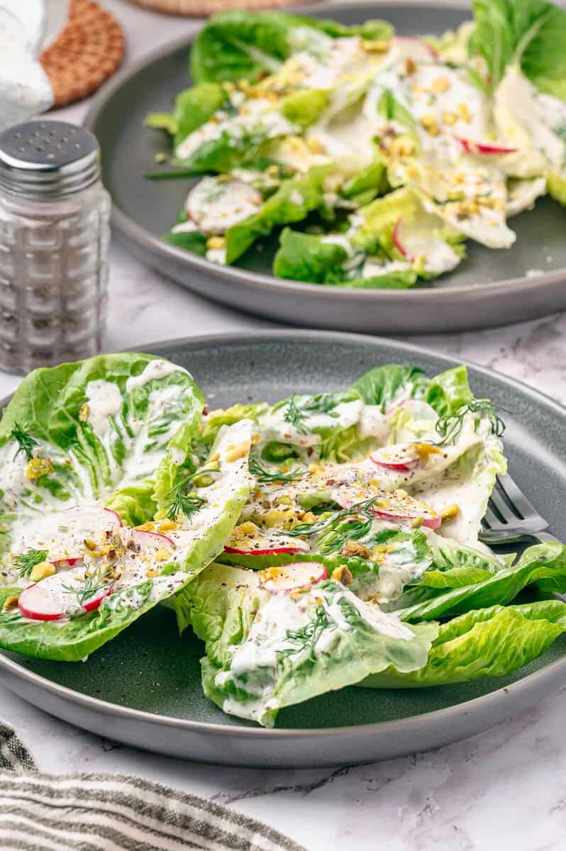 A seerving of Little Gem Salad with Coconut Ranch Dressing on a salad plate.