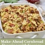 A baking dish full of baked cornbread dressing with sausage and pecans, plus text.